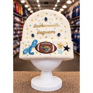 Jacksonville Jaguars Beanie‎ Cream design with teal and gold rhinestones, Logo